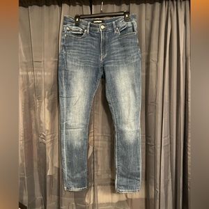 Express medium wash skinny leggings denim. Mid-Rise.